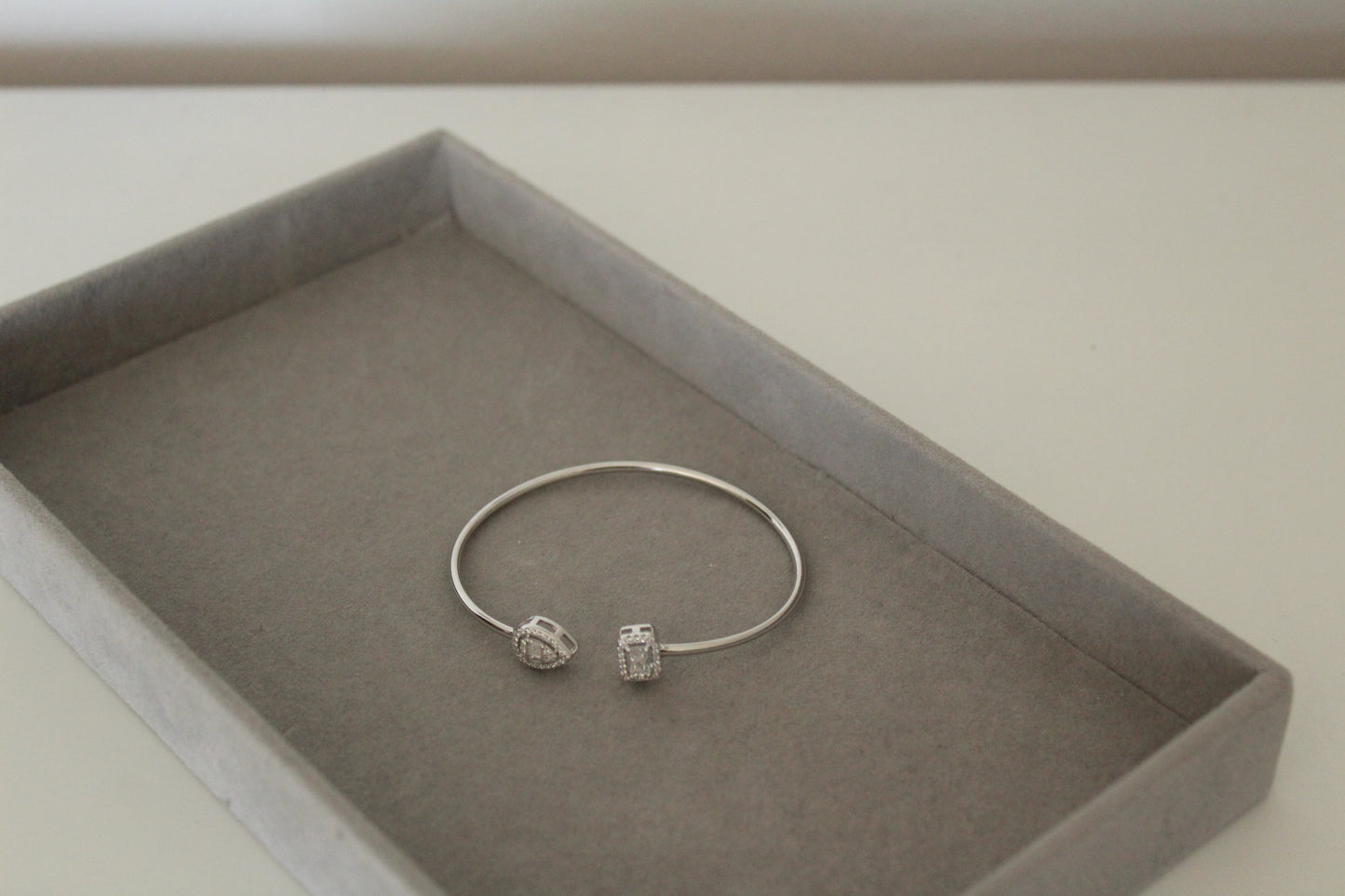 Open halo flexi silver bangle