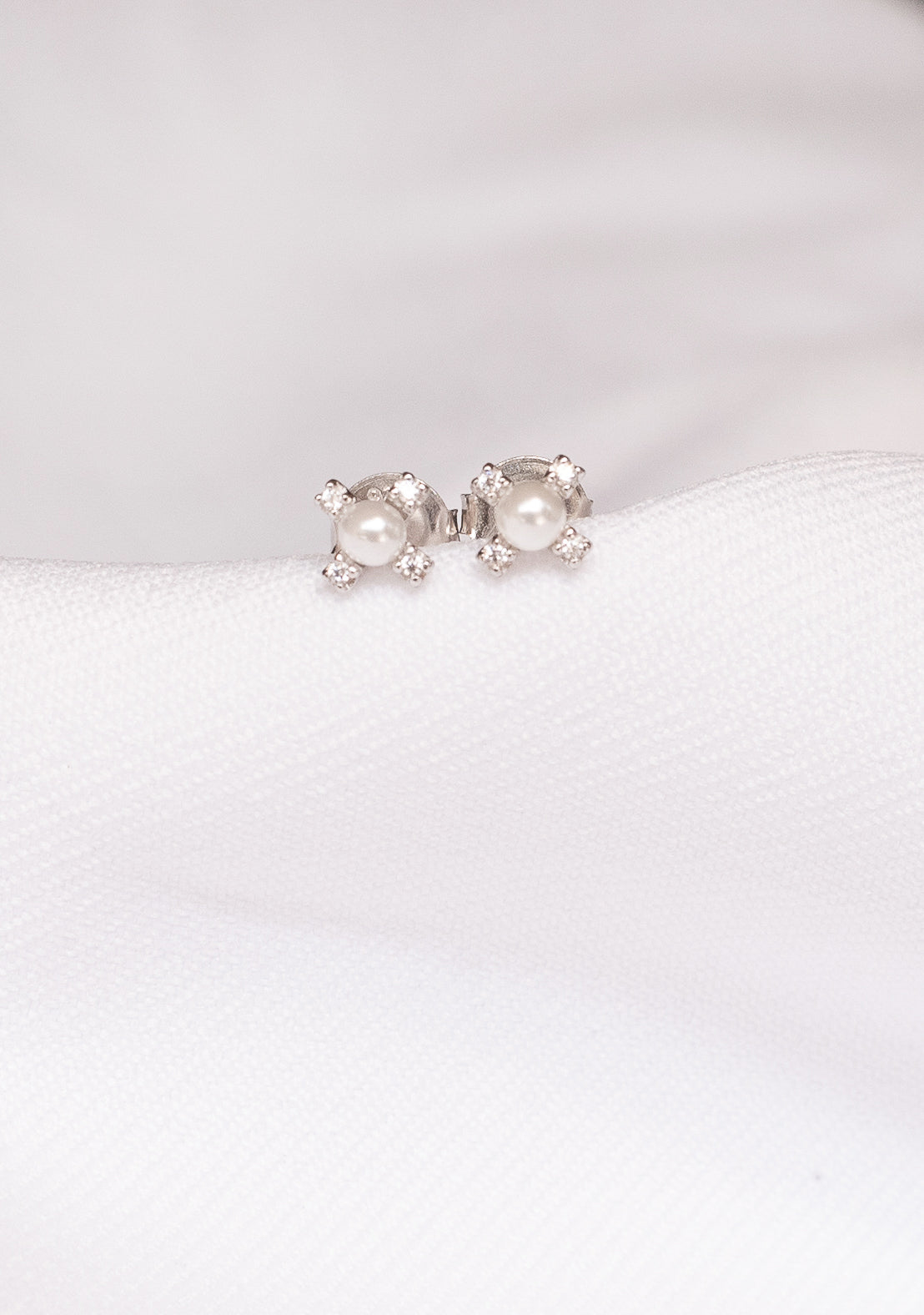 Micro pearl cross studs