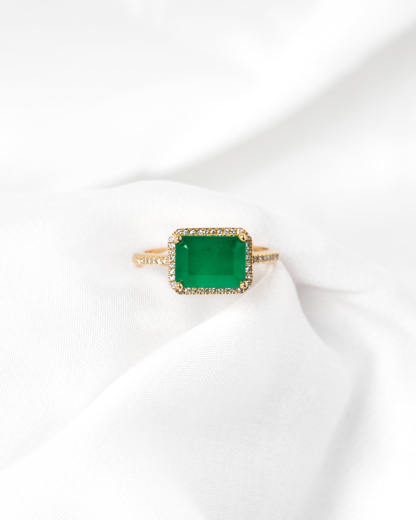 Emerald halo ring