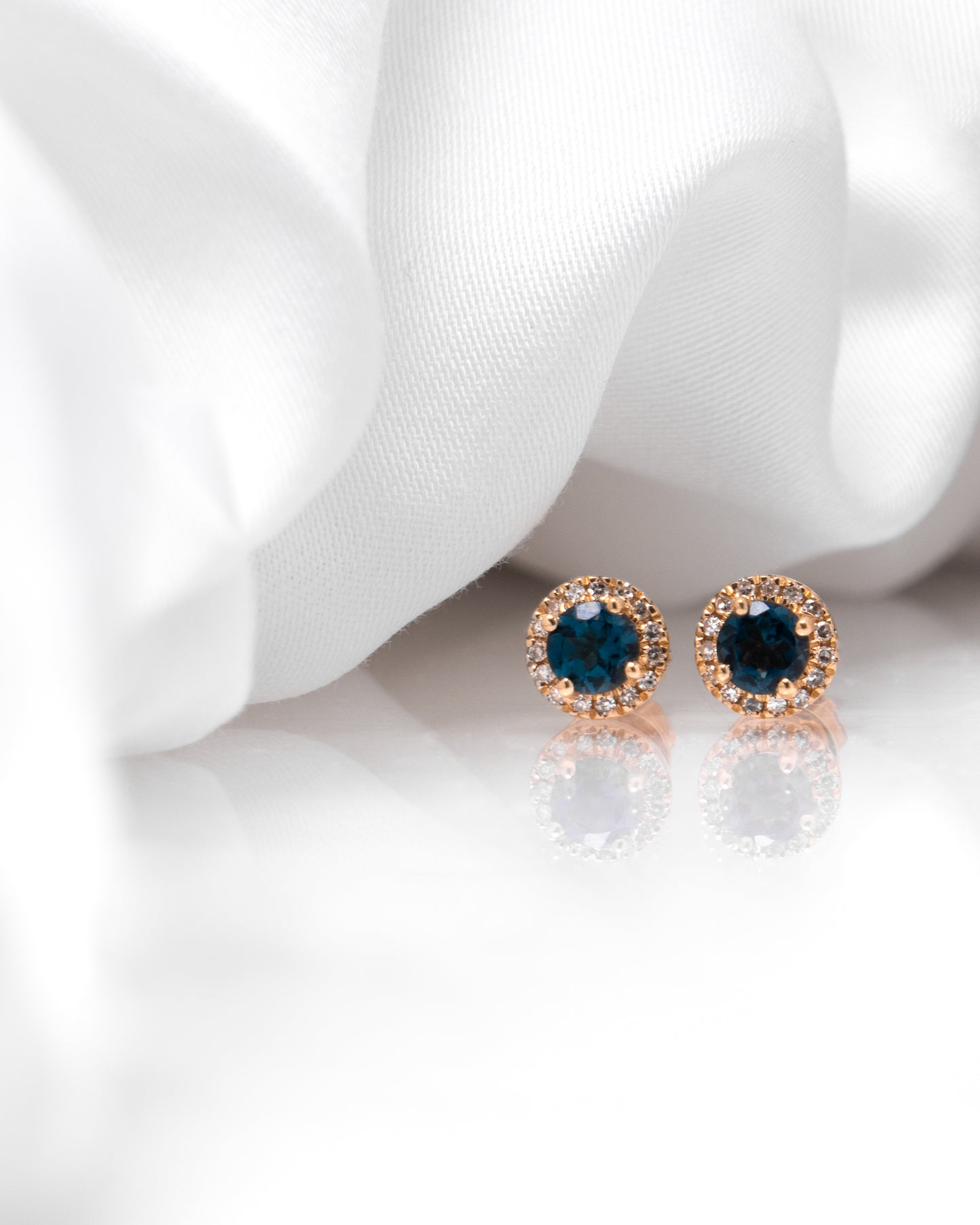 London blue topaz halo studs